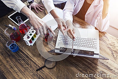 Science and technology education concept. Scientist or student using laptop to working in laboratory. Stock Photo