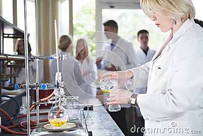 Scientific researcher doing a chemical experiment research.Science students working with chemicals. Chemist doing research with la Stock Photo