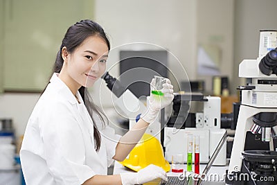 Scientist doing chemical test in laboratory Stock Photo