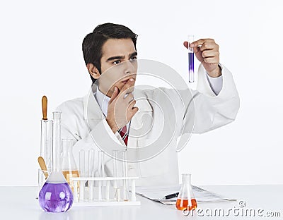 Scientist doing scientific experiment in a laboratory Stock Photo