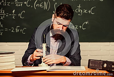 Scientist exploring. On way to success. Teacher work with microscope. Science concept. Scientist with microscope Stock Photo