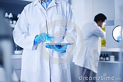 Scientist, hands and working on tablet in laboratory for planning, innovation and online research. Science, worker and Stock Photo