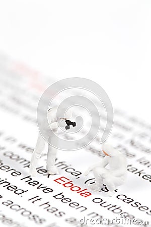 Scientist in protective Hazmat Suit find word ebola. Stock Photo