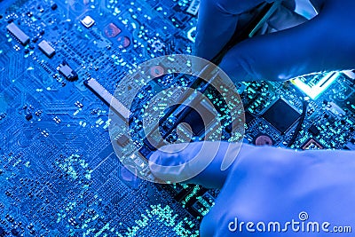 Scientist research and create micro electronic technology chip in the laboratory f Stock Photo