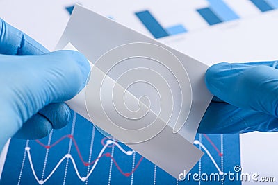 Scientist show white semi transparent layer of novel flexible material Stock Photo