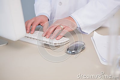 Scientist using computer Stock Photo