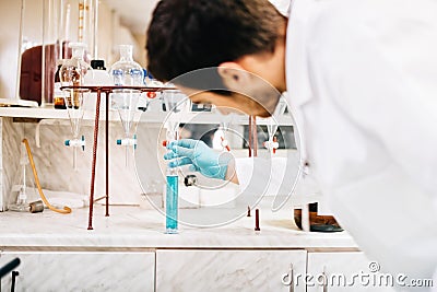 Scientist using lab tools, Test tubes in clinic, pharmacy and medical research laboratory Stock Photo