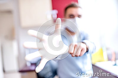 Scientist using a single-use rubber glove Stock Photo