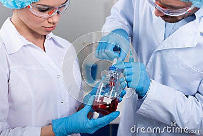 Scientists at chemical laboratory Stock Photo