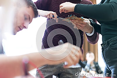 Scientists engineers designing small human robot, setting artificial intelligence humanoid robot. Artificial intelligence, Stock Photo