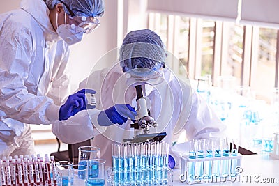 Scientists and researcher doing research for finding coronavirus, covid-19 vaccine disease Stock Photo