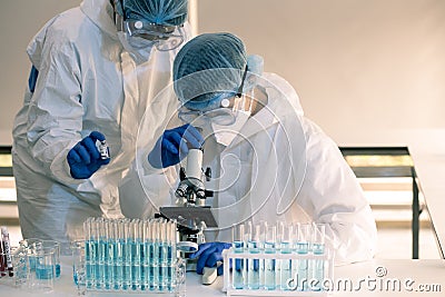 Scientists and researcher doing research for finding coronavirus, covid-19 vaccine disease Stock Photo