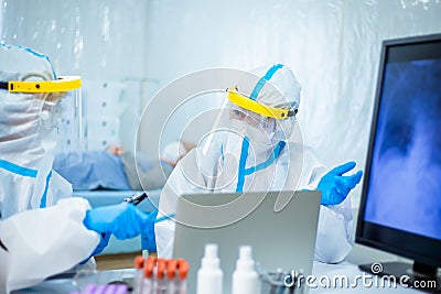 Scientists Studying Xray Of Lung Stock Photo