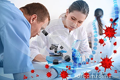 Scientists using modern microscope at table. Researching of virus Stock Photo