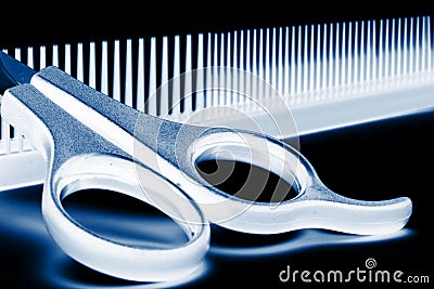 Scissors and hairbrush Stock Photo