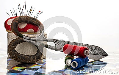 Scissors, needles and thread. Still life of a tailor Stock Photo