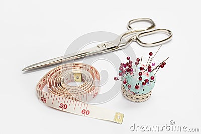 Scissors ,Tape Measuring and Needle Stock Photo