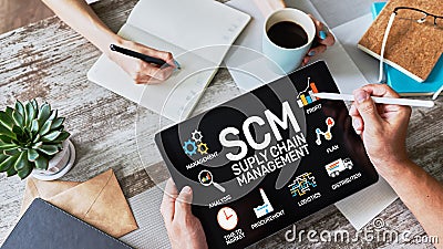 SCM - Supply Chain Management and business strategy concept on the screen. Stock Photo