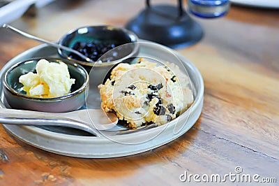 scone , blueberry scone or scone with whipped cream and blueberry dressing Stock Photo