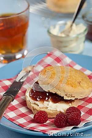 Scone with clotted cream and jam Stock Photo