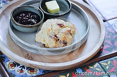 scone , cranberry scone or scone with butter and strawberry dressing Stock Photo