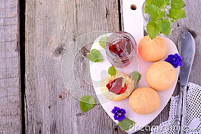 Scone with strawberry jam, afternoon tea , Stock Photo