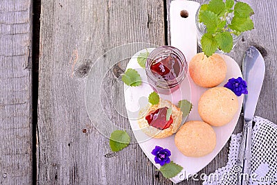 Scone with strawberry jam, afternoon tea , Stock Photo