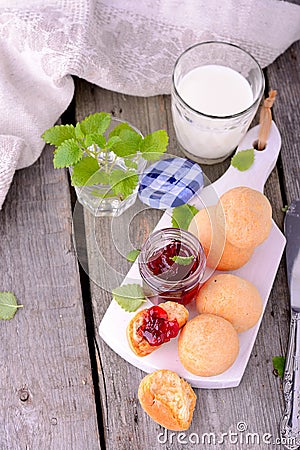Scone with strawberry jam, afternoon tea , Stock Photo