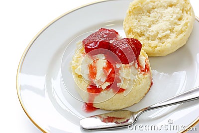 Scone strawberry jam clotted cream Stock Photo