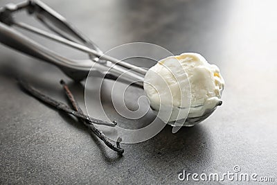 Scoop with tasty vanilla ice cream Stock Photo