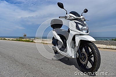 Scooter on the road Stock Photo