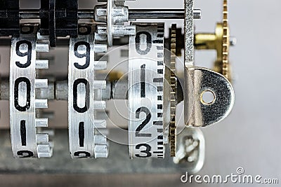 Scoreboard mechanism. metallic counter rolls with black digit. Stock Photo