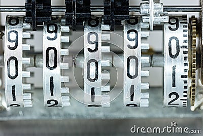 Scoreboard mechanism. metallic counter rolls with black digit. Stock Photo
