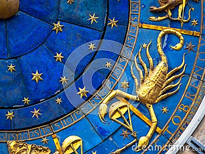 Scorpio astrological sign on ancient clock. Detail of Zodiac wheel with scorpion Stock Photo