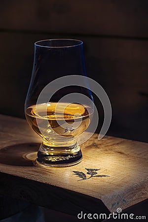 Scotch Whisky Neat in Nosing Glass Stock Photo