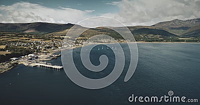 Scotland ocean port aerial view: ship, yachts and boats on coastal water of Atlantic gulf. Stock Photo
