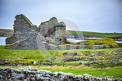 Scotland, Shetland Islands, Jarlshof is the best known prehistoric archaeological site in Shetland, Scotland. It lies near the Stock Photo