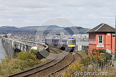 Scotrail train on Tay Bridge passing signalbox Editorial Stock Photo