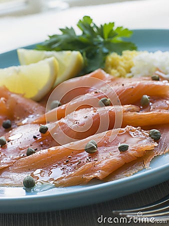 Scottish Smoked Salmon with Lemon Capers and Egg Stock Photo