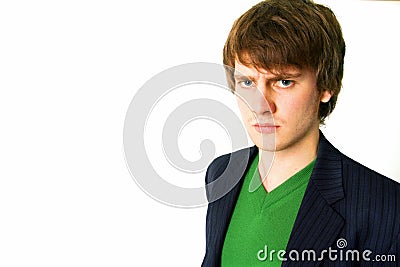 Scowling young man Stock Photo