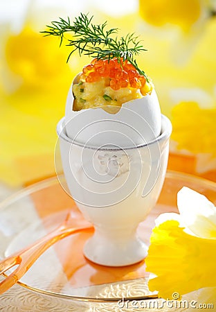 Scrambled egg with chives and red caviar Stock Photo