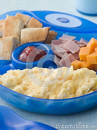 Scrambled Egg with Toast Ham and Cheese Squares Stock Photo