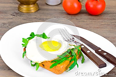 Scrambled Eggs with Arugula on Whole Grain Bread Health Food Stock Photo