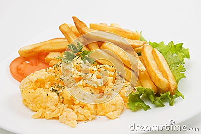 Scrambled eggs and french fries Stock Photo