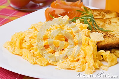 Scrambled eggs and french toast Stock Photo