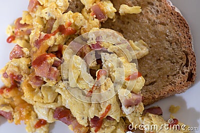 Breakfast scrambled eggs and toast Stock Photo