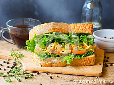 Scrambled eggs sandwich for breakfast. Stock Photo