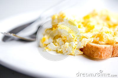 Scrambled eggs on toast Stock Photo