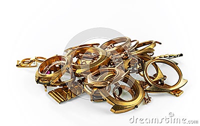 A scrap of gold. Old and broken jewelry, watches of gold and gold-plated Stock Photo