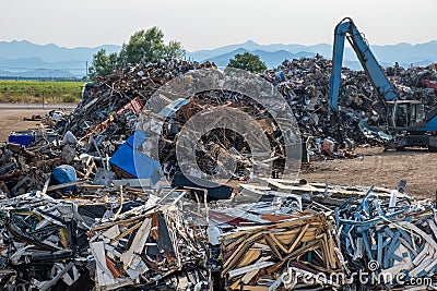 Scrap metal recycling center for sorting metal, aluminum, brass, copper, stainless steel from trash. Recycling industry Stock Photo